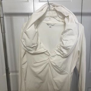 White, standup collar top.